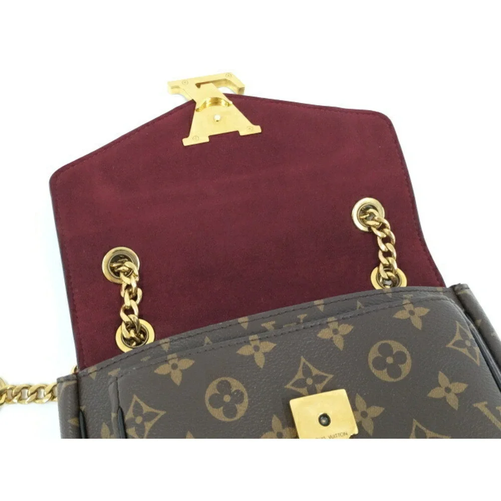 Louis Vuitton Monogram Canvas Shoulder Bag with Gold Hardware and Black Strap